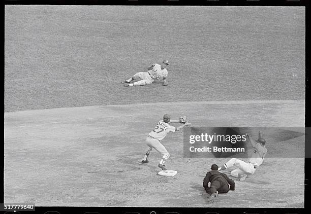 Fenway Park: Julian Javier has just tossed ball to Dal Maxvill after making a spectacular grab of ball hit behind second by Elston Howard in fourth...