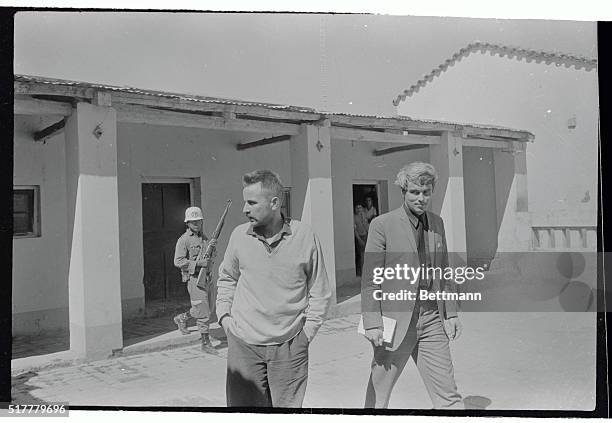 Year-old French Communist Regis Debray is led into a patio of the Camiri Military Club from his cell in the rear to hold a press conference. Debray...