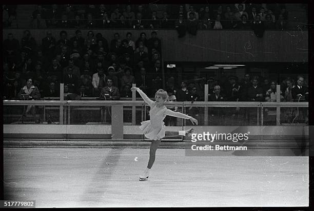 Janet Lynn , who is only 14 years old, is shown during free skating figure skating event in the Olympics.