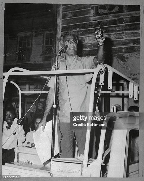 Dr. Cheddi Jagan , leader of the Opposition Party in Guyana, addresses a rally here 1/14, on the current Guyana-Surinam border dispute. At the bottom...