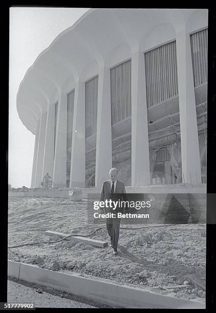 New Stadium. Inglewood, California: Jack Kent Cooke, walks outside his Forum sports arena which is scheduled to open on December 30. Cooke's hockey...