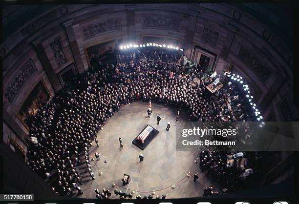 Wide-angle lens overhead view as casket of General Dwight Eisenhower lies in state in the rotunda of the Capitol, 3/30.