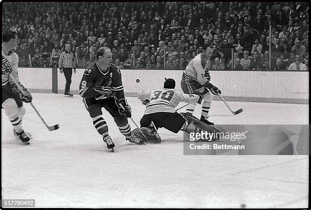 Bobby Hull, of the Black Hawks, tries to score but fails as Canadiens' goalie Rogatien Vachon makes a second-period save 3/19. Bobby, who did not...