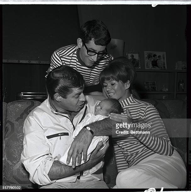 Comedian Jerry Lewis tries to get a laugh out of his first grandchild as proud father, Gary Lewis, and mother, Junky, look for a reaction. The baby,...