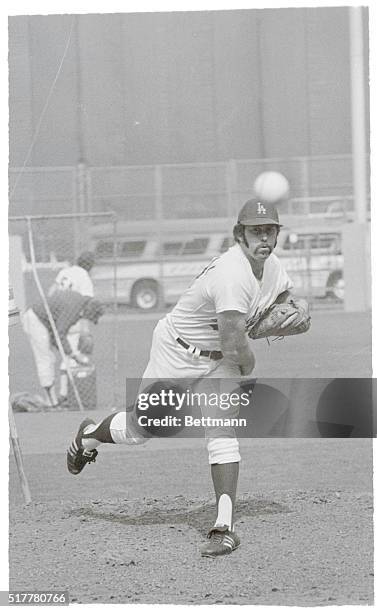 Dodger Stadium: Los Angeles Dodgers crack relief pitcher Mike Marshall works out from the mound to be ready in case his talent is needed for the...