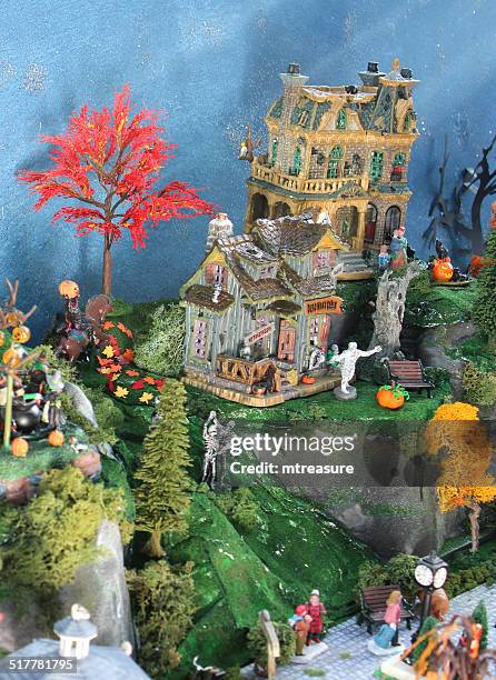 model halloween spooky-town / village, miniature people, fall-autumn, haunted house, pumpkins - haunted mansion exterior stock pictures, royalty-free photos & images