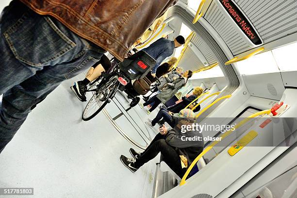 copenhagen travellers in subway - copenhagen metro stock pictures, royalty-free photos & images