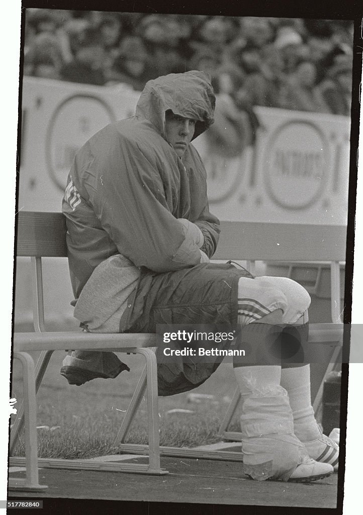 John Hannah Sitting Wrapped up on The Sidelines