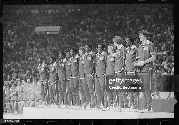 Montreal: The USA mens basketball team, wearing their gold medals about their necks, are lined up after the presentation here 7/27. The US won the...