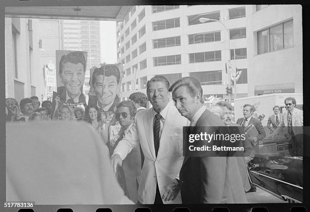 Kansas City: A tight lipped Ronald Reagan, whose presidential hopes have been fading, leaves hotel after meeting with the New York delegation....