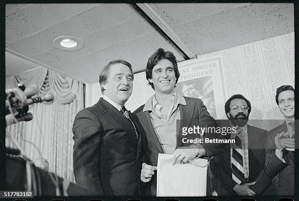 Chicago: Democratic presidential candidate Sargent Shriver gets some morale support from his son Robert after Shriver announced he was dropping out...