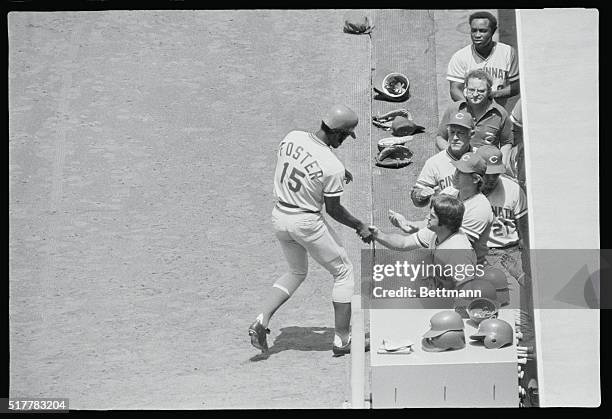 Los Angeles, California: Dodger's left fielder Dusty Baker is draped over the railing after reaching for a solo homer hit into the stands by...