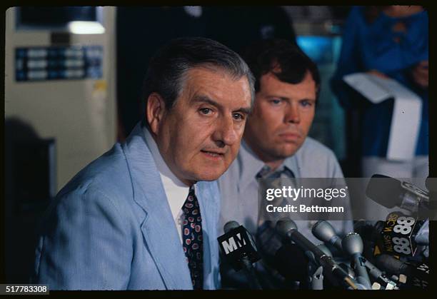 Chief of Detectives John Keenan and Deputy Police Commissioner Frank McLaughlin look frustrated as they answer newsmen's question concerning progress...