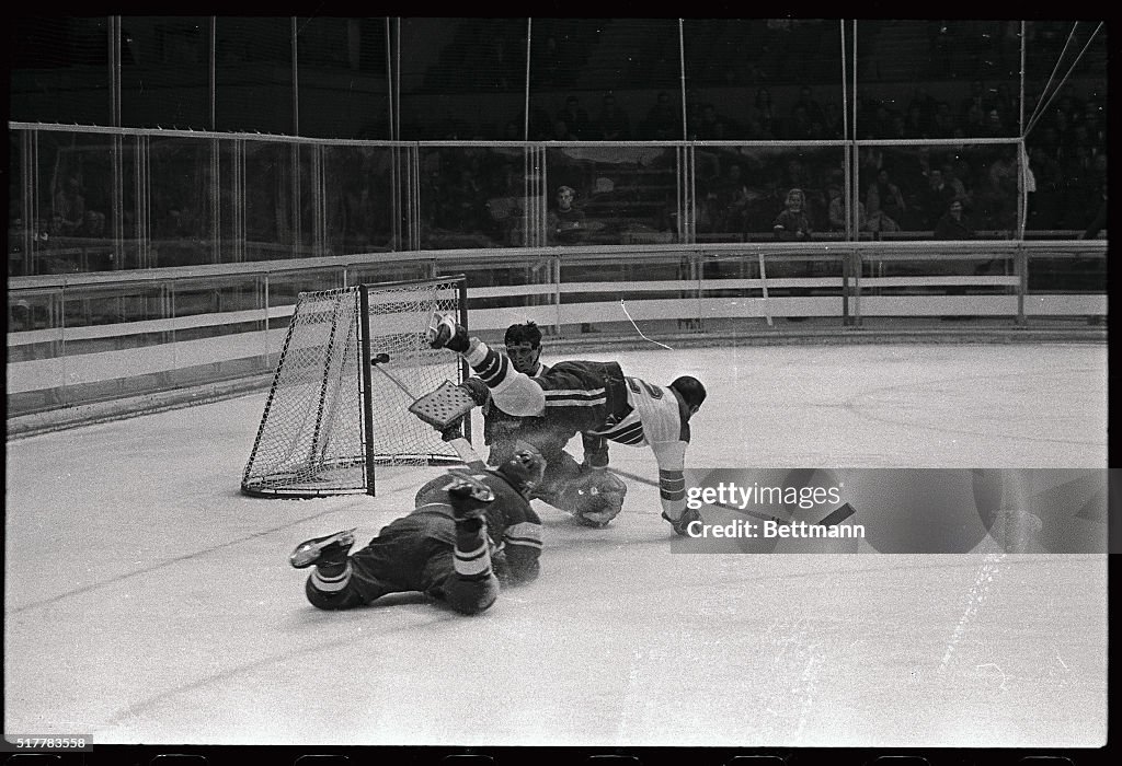 Hockey Players Tumbling over Each Other