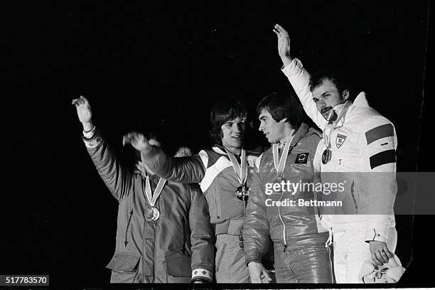 Winners of the medals of the 1,000 meter speedskating event at the 1980 Winter Olympics pose with their medals after presentation ceremonies. From...