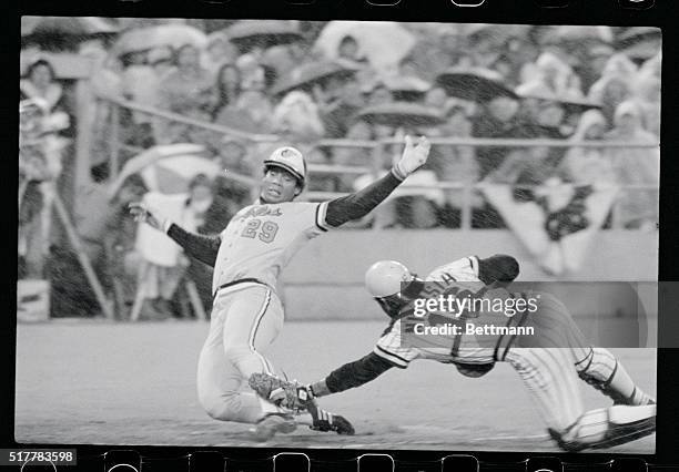 Baltimore's Ken Singleton is out at home trying to score from second on a single in the third inning. It would have been the tying run. Pirate's...