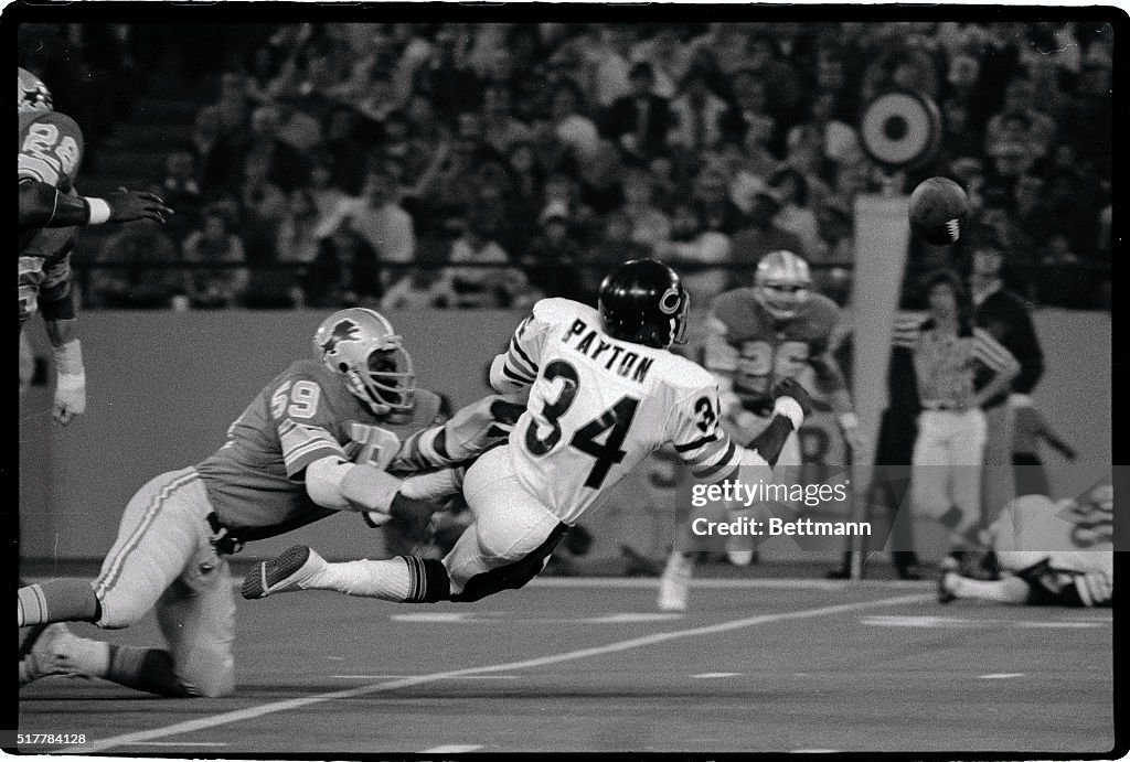 Walter Payton Fumbles Ball in Football Game