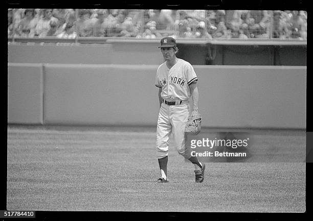 Boston: New York Manager Billy Martin takes a turn in right field as rightfielder Reggie Jackson awaits his turn at bat as the team took batting...