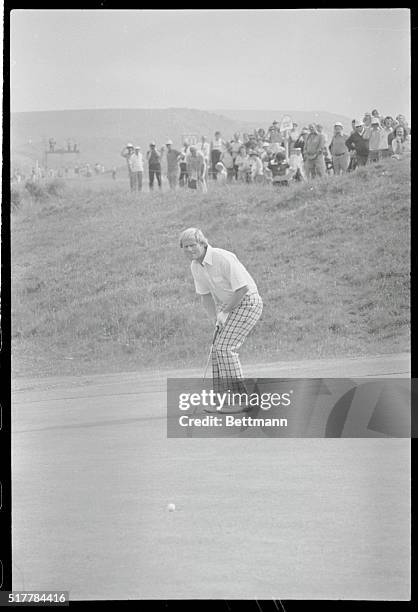 Jack Nicklaus on the 5th green during the 3rd round of the British Open Golf Championships. The game was delayed later because of a thunderstorm.