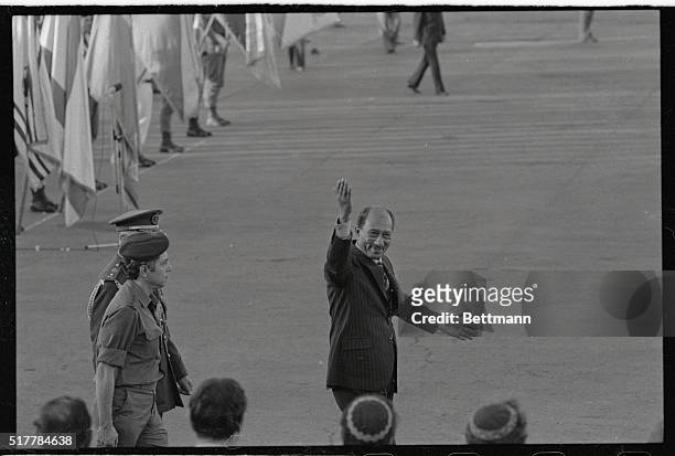 In an open-armed gesture of friendship and farewell Egyptian President Anwar Sadat says "Thank you" to Israelis prior to departure for Cairo here...