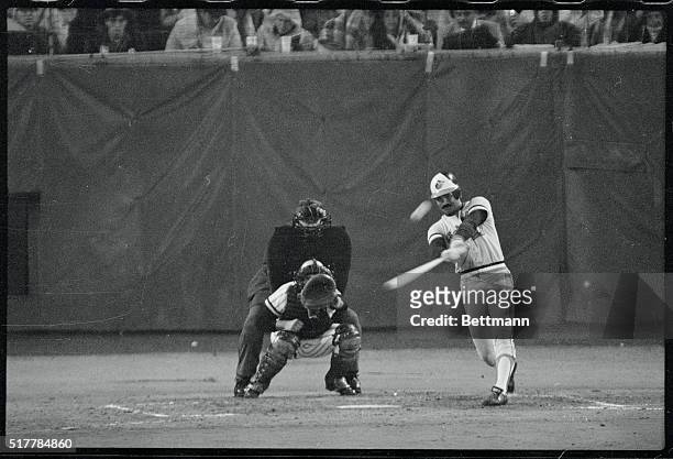 Baltimore's Benny Ayala connects for a two run homer in the third inning of World Series game. Pirates catcher is Steve Nicosia, Umpire is Russ Geetz.