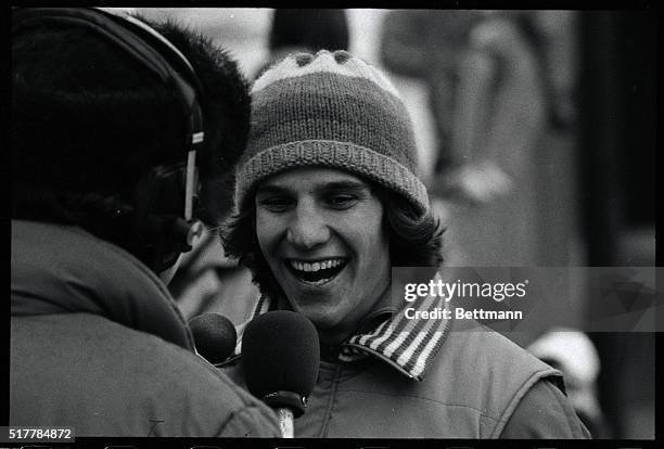 Eric Heiden, American speedskating star who swept to his fourth consecutive gold medal in Olympic record time in the 1500 meter event 2/21, wears a...