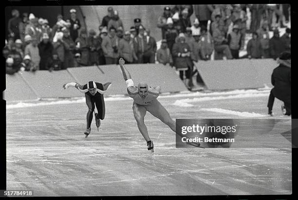 America's Eric Heiden sets a new Olympic record in the 1000 meter speedskating event as he beats Canada's Gaeten Boucher in the first heat of the...