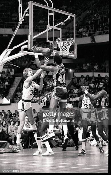 Pacers' Jim Edwards blocks a scoring attempt by Celtics' Larry Bird during 3rd quarter action at Boston Garden 2/8. The Celtics won the game, 130-108.
