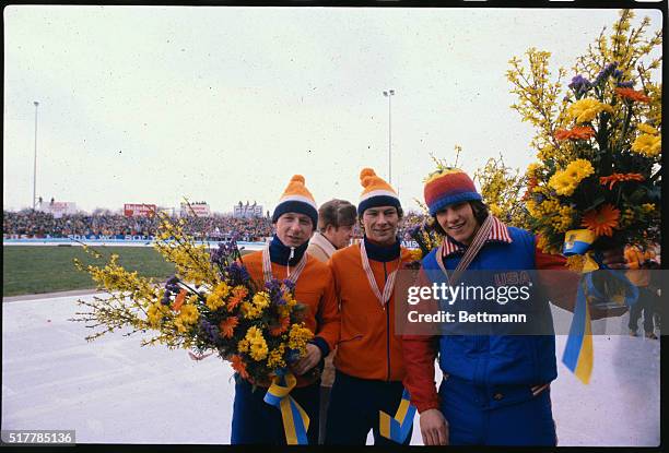 At the World Speed Skating Championship for Men. The ceremony of awarding medals of the 1500 meter race. From left to right: Eric Heiden , Hilbert...