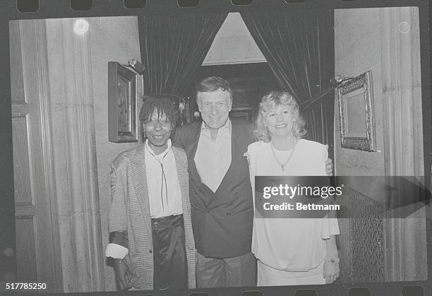Hollywood: Whoopi Goldberg, Hugh Hefner and Dr. Lois Lee pose together during gala benefit for "Children of the Night" held at the Playboy mansion....