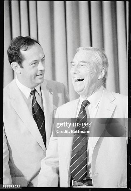 Senators Bill Bradley, , and Lloyd Bentsen, , share a laugh at the opening session of the congressional conference on the tax reform bill.