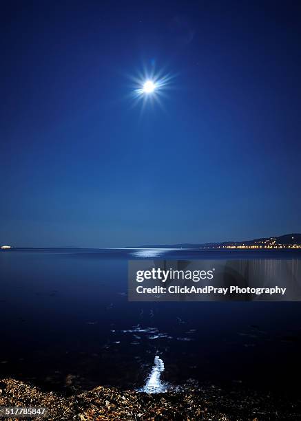 moon reflected - argyle stock pictures, royalty-free photos & images