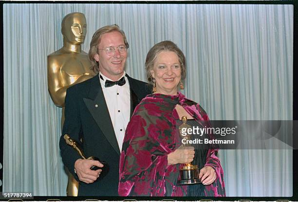 Los Angeles: Best Actor winner William Hurt and Best Actress winner Geraldine Page smile while holding their Oscars, at the Dorothy Chandler Pavilion.