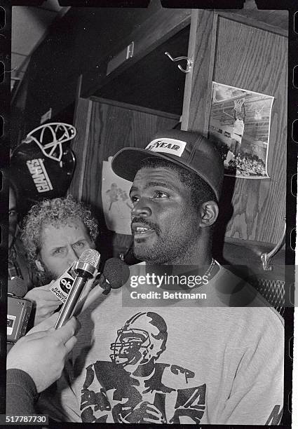 Giant's linebacker Lawrence Taylor talks to the press in Giants locker room here on October 14th, after crossing the NFL players picket line. Taylor...