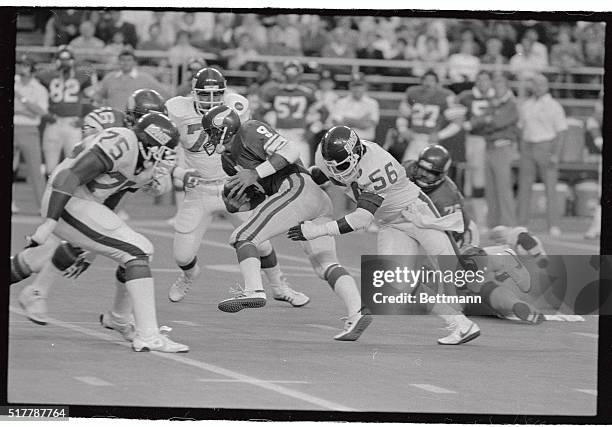 Minnesota quarterback Tommy Krammer gets sacked by New York Giant linebacker Lawrence Taylor in the first half in this photograph.