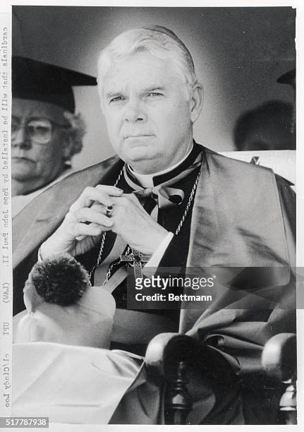 Archbishop Bernard F. Law looks over the more than 2,500 graduates of Boston College at the 109th commencement exercises at Alumni Stadium 5/20....