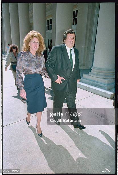 Charlotte, NC: Jessica Hahn leaves the Federal Courthouse holding hands with attorney Dominic Barbara after finishing her testimony before a grand...
