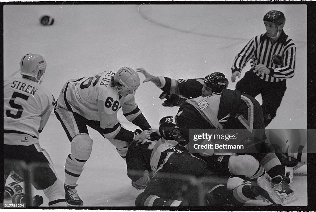 Defensive Action Between Hockey Players