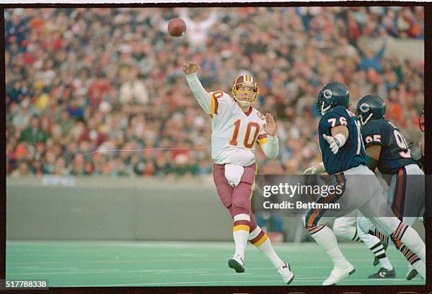 Chicago: Washington Redskins quarterback Jay Schroeder helped clinch a Bears defeat with 15 completions on 32 passes for 184 yards and two TD passes....