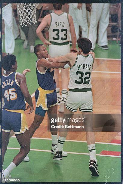 Boston: Lakers' Byron Scott and Celtics' Kevin McHale grab each other during fight in the third quarter of Game 4 of series at Boston Garden. Lakers...