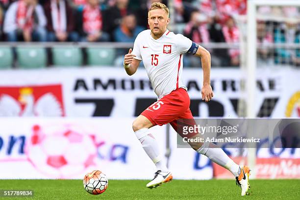 Kamil Glik of Poland controls the ball during the international friendly soccer match between Poland and Finland at the Municipal Stadium on March...