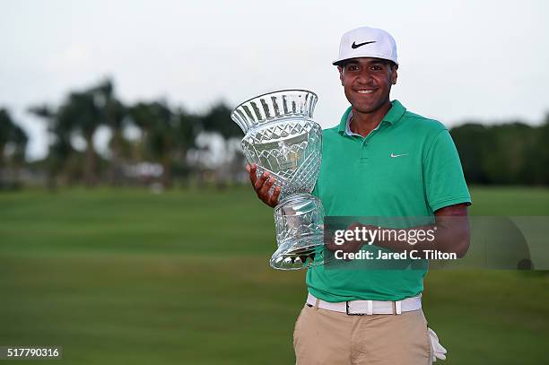 Tony Finau poses with the trophy after winning the Puerto Rico Open at Coco Beach on March 27, 2016 in Rio Grande, Puerto Rico.