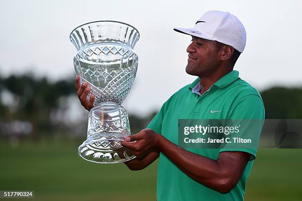 Tony Finau poses with the trophy after winning the Puerto Rico Open at Coco Beach on March 27, 2016 in Rio Grande, Puerto Rico.