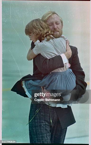 American hostages of the hijacked TWA plane in Beirut return home to Andrews Air Force Base in D.C. Greeted by Pres. And Mrs. Reagan.