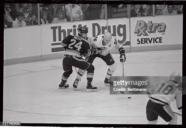 With Canuck's goalie, Richard Brodeur down, Penguin's Mario Lemieux shoots puck through the back door for his 39th goal of the season in the second...