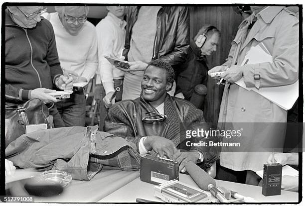Chicago Bears' running back Walter Payton, answers questions at a press conference before taking to the practice field 1/8. Payton and the Bears' are...