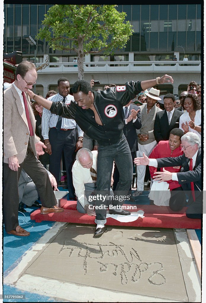 Comedian Eddie Murphy Being Printed at Mann's Chinese Theater