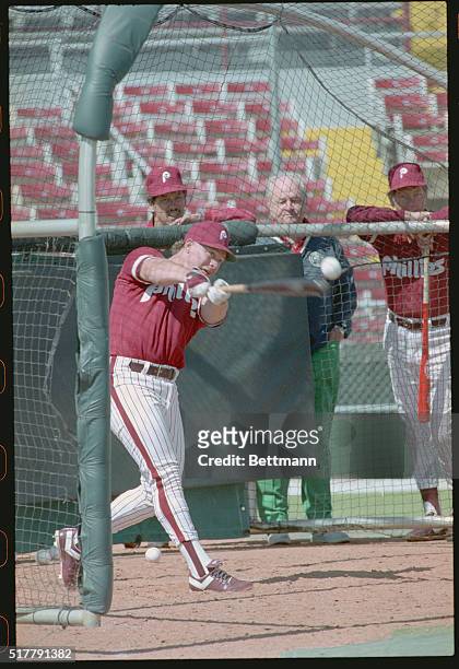 Clearwater, Fla.: Phillies outfielder Lenny Dykstra connects with the ball during his turn in the batting cage. Dykstra was obtained from the N.Y....