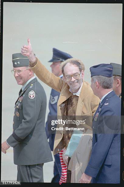 Andrews Air Force Base, Md.: Freed U.S. Hostage Robert Pohill gives the thumbs up sign as he arrives home on U.S. Soil here.