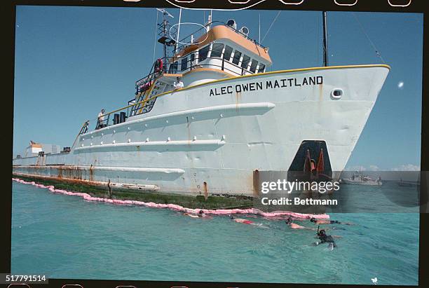 Key Largo, Fla: A group of divers, including Governor Bob Martinez survey reef damage to the Key Largo National Marine Sanctuary after the 155 foot...